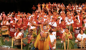 Emosi Damuni (in front), as he had done many times in the previous nearly 40 years, led the Polynesian Cultural Center's 40th-anniversary alumni night show cast in singing the PCC signature song, Bula Laie.