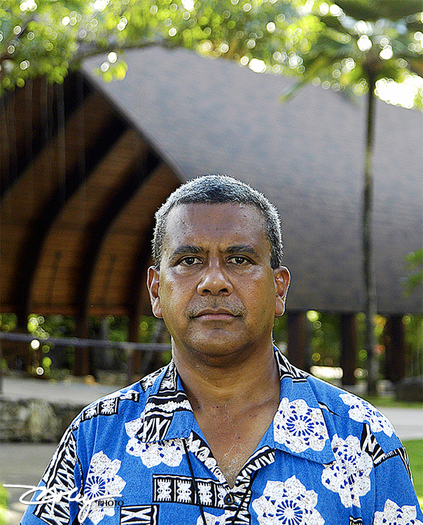 Ratu Seru Inoke Suguturaga, "chief" of the Fijian Village in 2004, stands in front of the camakau canoe's new "home."